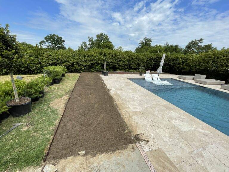 Beautify poolside landscaping installed by Eric's Tidy Turf, LLC