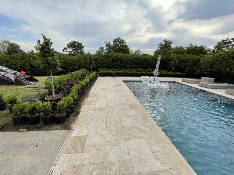 Beautify poolside landscaping installed by Eric's Tidy Turf, LLC