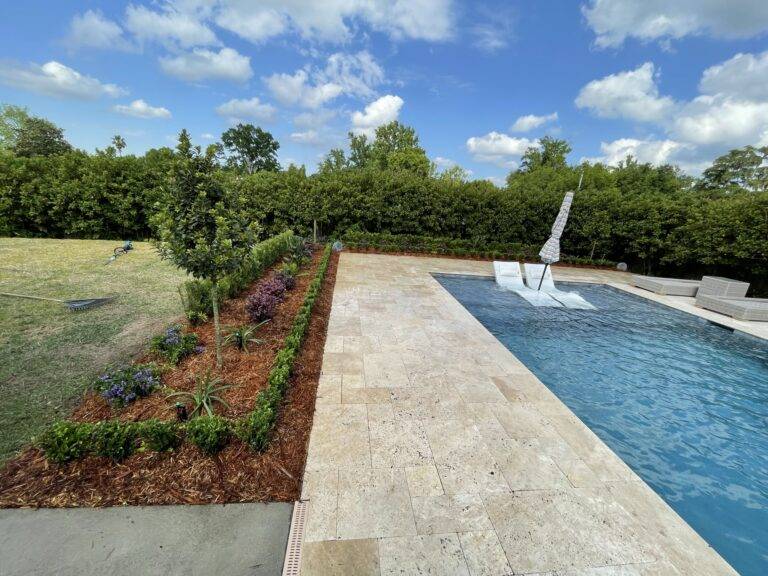 Beautify poolside landscaping installed by Eric's Tidy Turf, LLC