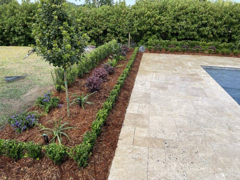 Beautify poolside landscaping installed by Eric's Tidy Turf, LLC