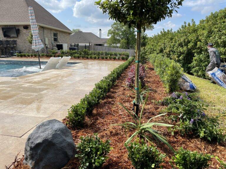 Beautify poolside landscaping installed by Eric's Tidy Turf, LLC