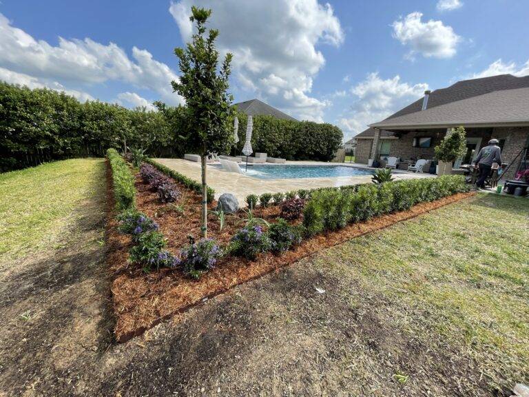 Beautify poolside landscaping installed by Eric's Tidy Turf, LLC