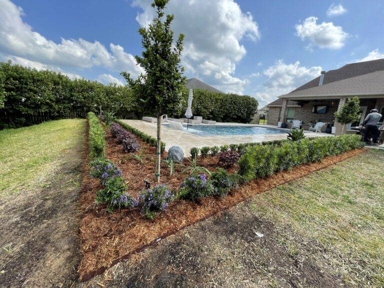 Beautify poolside landscaping installed by Eric's Tidy Turf, LLC