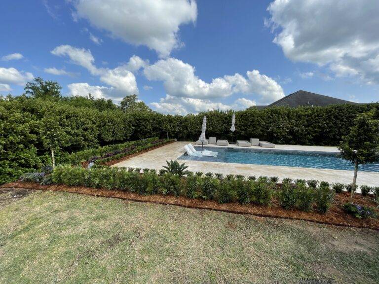 Beautify poolside landscaping installed by Eric's Tidy Turf, LLC