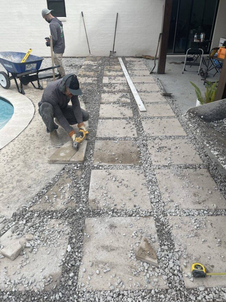 Poolside pavers crafted and installed by Eric's Tidy Turf, LLC in the greater new orleans area