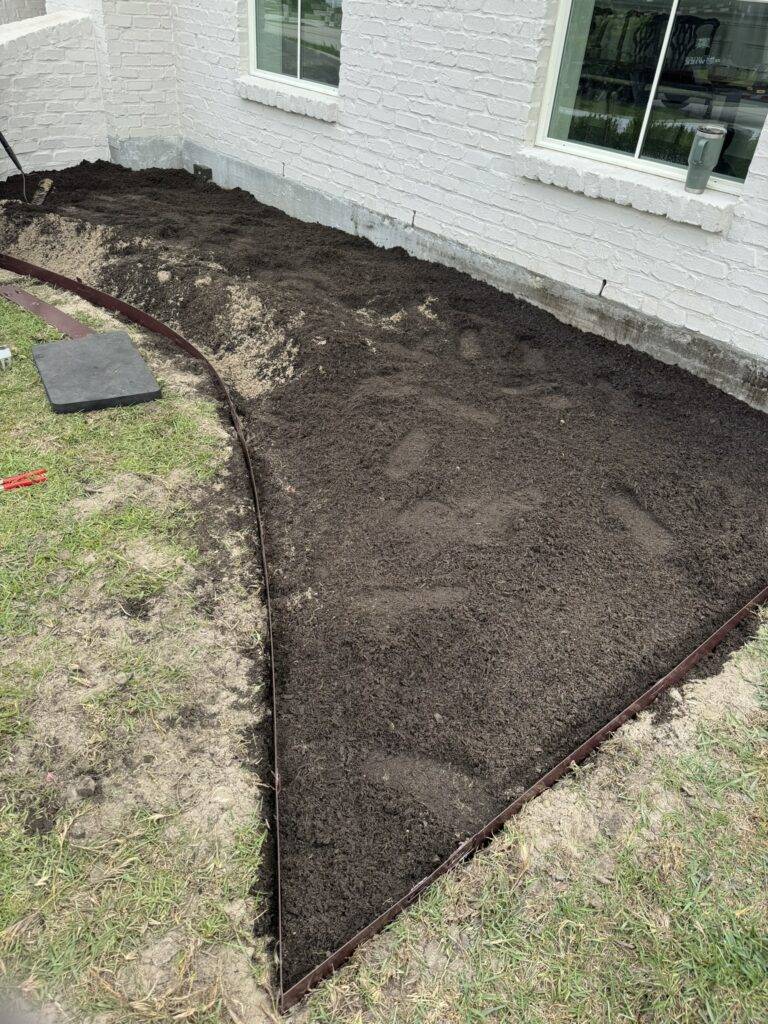 beautiful crafted landscaping project installed by Eric's Tidy Turf, LLC in the greater new orleans area