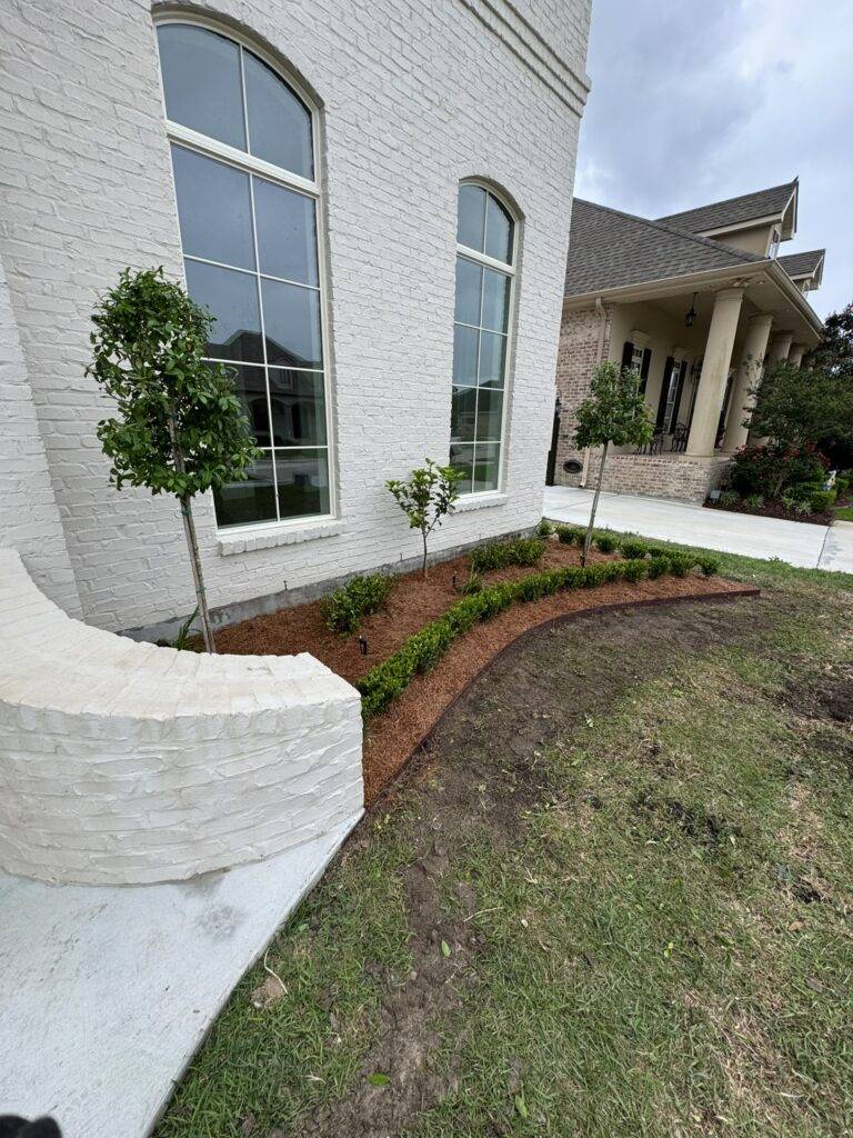 beautiful crafted landscaping project installed by Eric's Tidy Turf, LLC in the greater new orleans area