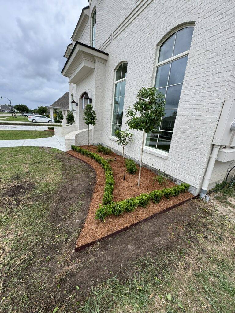 beautiful crafted landscaping project installed by Eric's Tidy Turf, LLC in the greater new orleans area