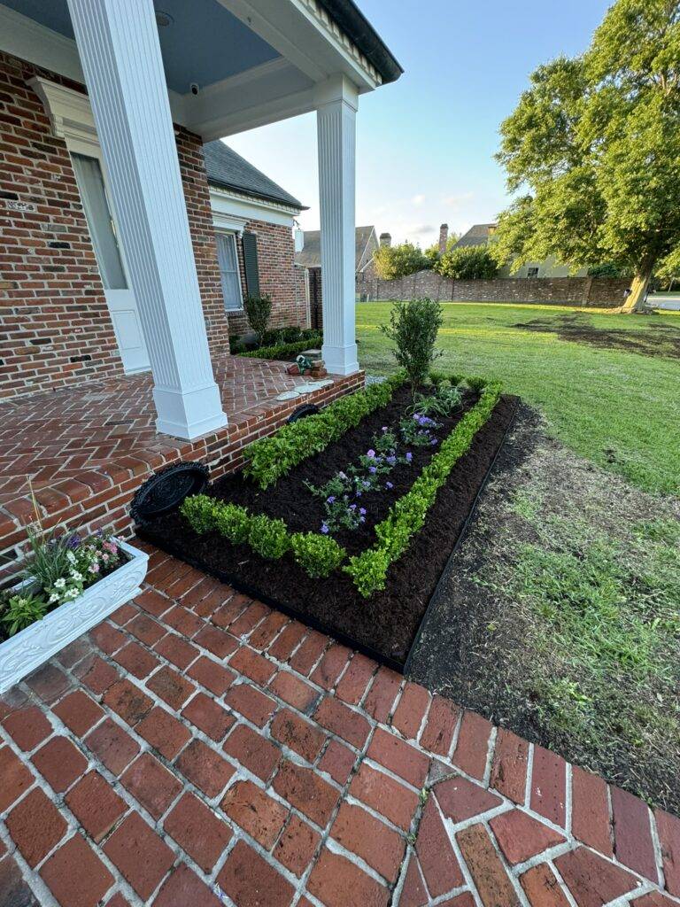 beautiful crafted landscaping project installed by Eric's Tidy Turf, LLC in the greater new orleans area