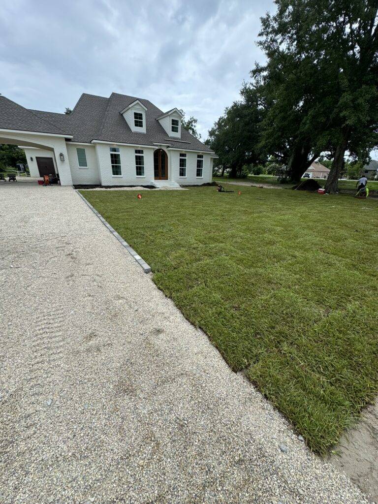 Sod grading and hardscaping installation by Eric's Tidy Turf, LLC in the greater new orleans area