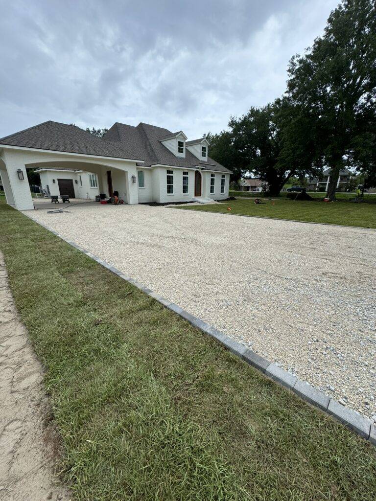 Sod grading and hardscaping installation by Eric's Tidy Turf, LLC in the greater new orleans area