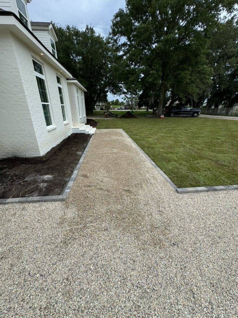 Sod grading and hardscaping installation by Eric's Tidy Turf, LLC in the greater new orleans area