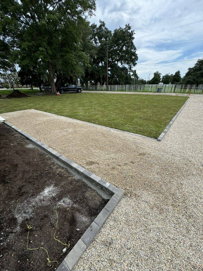 Sod grading and hardscaping installation by Eric's Tidy Turf, LLC in the greater new orleans area