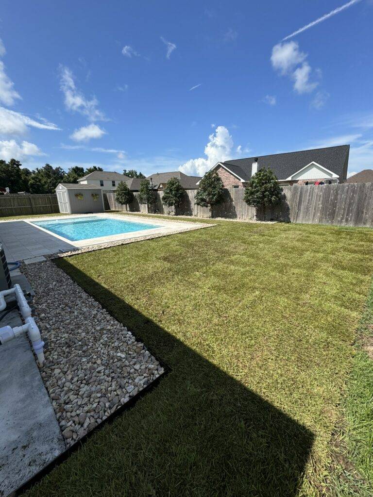 Sod grading and hardscaping installation by Eric's Tidy Turf, LLC in the greater new orleans area