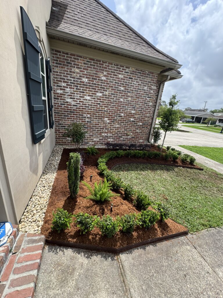 beautiful crafted landscaping project installed by Eric's Tidy Turf, LLC in the greater new orleans area