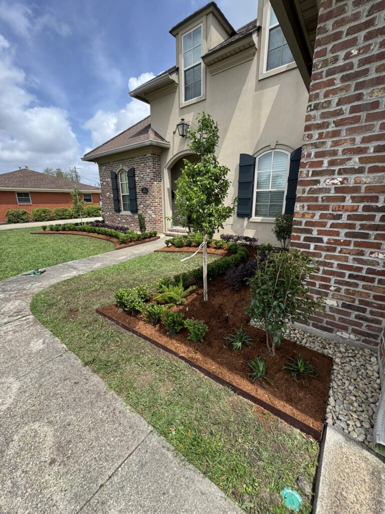 beautiful crafted landscaping project installed by Eric's Tidy Turf, LLC in the greater new orleans area