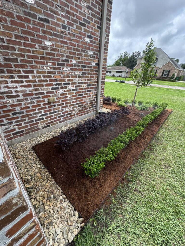 beautiful crafted landscaping project installed by Eric's Tidy Turf, LLC in the greater new orleans area