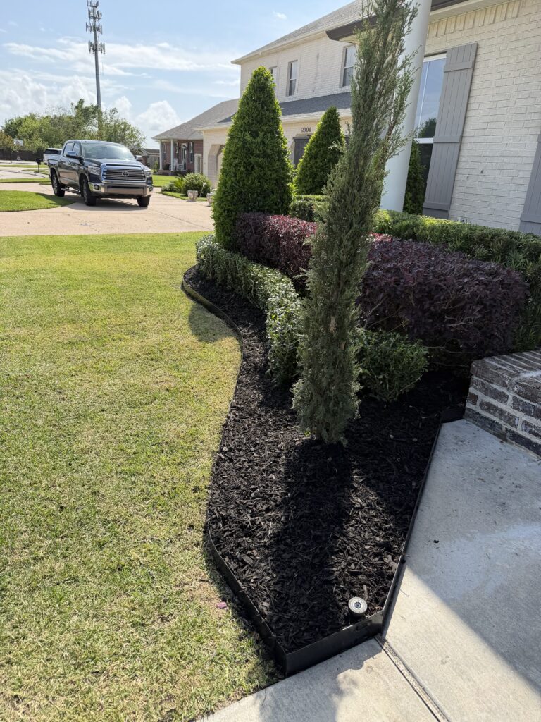 beautiful crafted landscaping project installed by Eric's Tidy Turf, LLC in the greater new orleans area